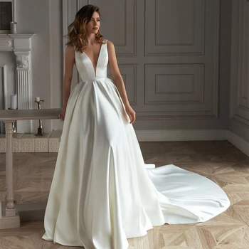 Бяло Атласное Сватбена рокля В сгъвката на Трапецовидна форма С V-образно Деколте Без Ръкави, Сексуална Сватбена рокля С Перлата на Влак, Сватбената рокля 2023 Vestidos De Новия